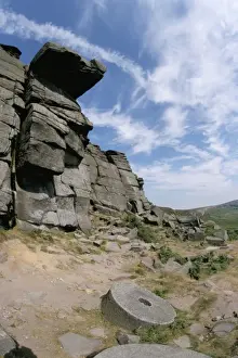 Surface Processes Prints: Old millstones left at quarried edge of gritstone (millstone grit), Stanage Edge