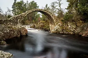 Flowing Prints: The old packhorse bridge built in 1717 over the River Dulnain in the village of Carrbridge