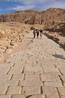 Images Dated 4th November 2009: Old Roman cobbled street with view of the royal tombs, Petra, UNESCO World Heritage Site