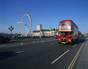 Old Routemaster bus before they were withdrawn, on Wesminster Bridge with London Eye in background
