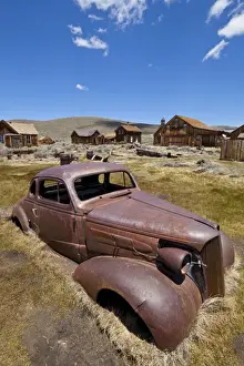 Gold Mining Prints: Old rusty American car in the California gold mining ghost town, Bodie State Historic Park