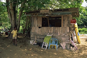 Tobago Prints: An old shack on the beach selling food and drinks
