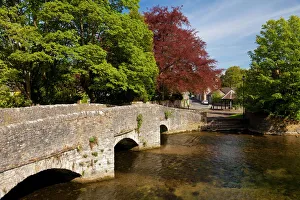 Derbyshire Prints: The old Sheepwash Bridge over the River Wye at Ashford in the Water