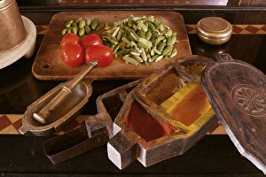 Ahmedabad Prints: Old spice box and brass pestel and mortar in restored