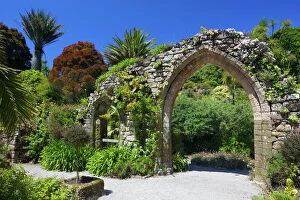 Isles Of Scilly Collection: Old stone archway from the ruined abbey in the sub-tropical Abbey Gardens