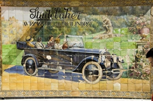 Old tile ad for Studbaker car