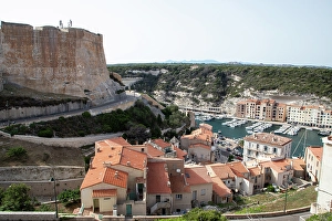 Sailboats Prints: Old town of Bonifacio built on cliff rocks, Island of Corsica, France