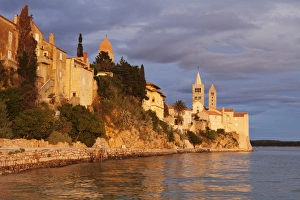 Belltower Prints: Old town of Rab town with four medieval belltowers at sunset