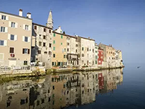 Rippled Gallery: The Old Town with reflections early morning, Rovinj, Istria, Croatia, Europe