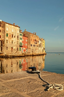 Azure Prints: Old town of Rovinj mirroring in the water, Istria, Croatia