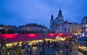 Old Town Square at Christmas time and St. Nicholas church, Prague, Czech Republic, Europe