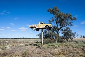 Old truck on a huge pole in the Mungo National Park, part of the Willandra Lakes Region, UNESCO World Heritage Site