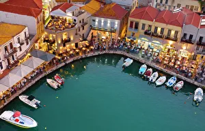 Eateries Prints: Old Venetian harbour and restaurants at dusk