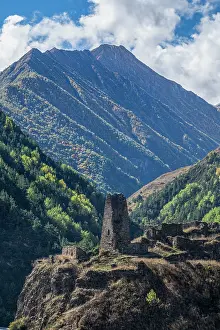 Terrain Prints: Old watch tower standing on the border of South Ossetia with mountains in the background in North Ossetia