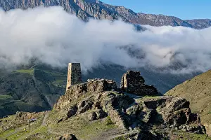 Terrain Prints: Old watchtower stands on hill overlooking mountains in North Ossetia