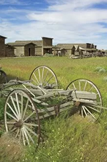 Old western wagons, restored storefronts, homes and saloons from the pioneering days of the Wild West at Cody, Montana