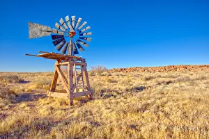 An old windmill marking the boundary of the Devil's Playground in Petrified Forest An old windmill marking the boundary of the Devil's Playground in Petrified Forest