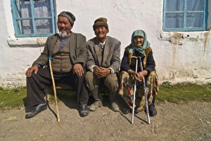 Senior Man Prints: Three oldies sitting on a bench and having a chat, At Bashy, Kyrgyzstan
