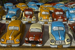 Images Dated 7th April 2007: Oldtimers made of sheet metal as souvenirs for sale, Sancto Spirito, Cuba