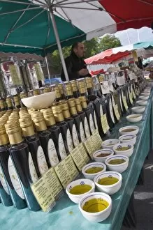 Olive oil stall at the Italian market at Walton-on-Thames, Surrey, England