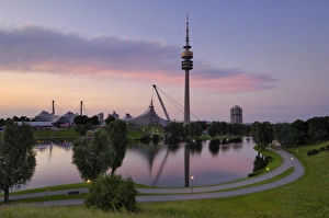 Olympiapark and Olympiaturm (TV tower) at dusk, Munich (Munchen), Bavaria Olympiapark and Olympiaturm (TV tower) at dusk, Munich (Munchen), Bavaria