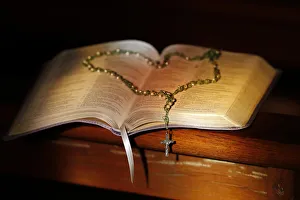 Rosary Prints: Open Bible and rosary in a church, Haute-Savoie, France, Europe