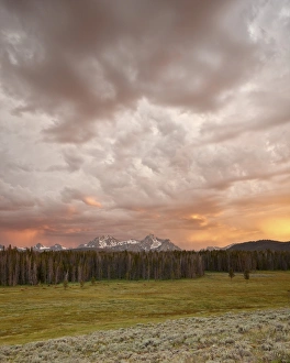 Idaho Prints: Orange clouds at sunset over The Sawtooth Mountains
