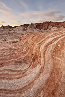 Sand Stone Prints: Orange and white sandstone layers with colorful clouds at sunrise