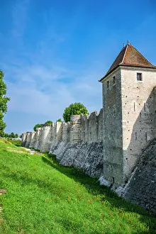 Fortifications Prints: Original fortifications of Provins in France are visible against a clear sky with green grass below