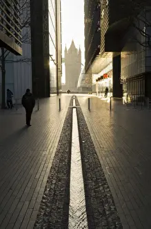 Ornamental Prints: Ornamental stream flows through More Place with Tower Bridge at end of tunnel of buildings