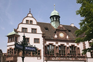 Images Dated 26th May 2009: Ornate street sign and 16th century Altes Rathaus (Old City Hall) built 1559