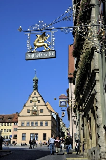 Appliance Prints: Ornate wrought iron shop sign with the Ratstrinkstube