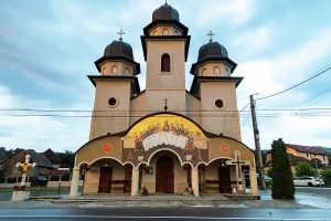 Center Prints: Orthodox church stands under heavenly light in Romania during early morning