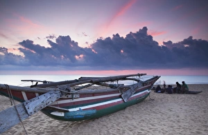 Negombo Prints: Oruwa (outrigger canoe) on beach at sunset