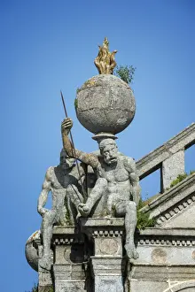Strength Prints: Detail of Os Meninos da Graca statues supporting the terrestrial globe
