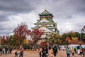 Public Space Prints: Osaka Castle in autumn with visitors in front, Osaka, Honshu, Japan, Asia