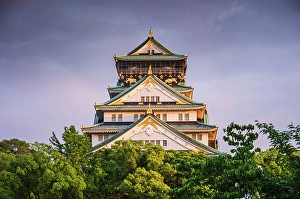 Osaka Prints: Osaka Castle illuminated at golden hour, Osaka, Honshu, Japan