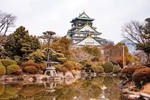 Aesthetics Prints: Osaka Castle in Japan Reflecting in a Pond of a japanese Castle. Autumnal Colors in Winter