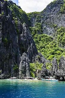 Filipino Culture Prints: Outrigger boats in the crystal clear water in the Bacuit archipelago