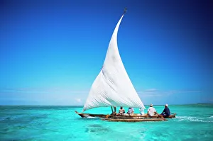 Leisure Activity Prints: Outrigger canoe with sail on Indian Ocean, off Jambiani, Zanzibar, Tanzania