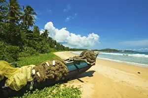 Matara Prints: Outrigger fishing boat and nets at this quiet south coast retreat beach