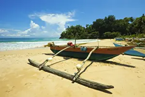 Matara Prints: Outrigger fishing boat at this quiet south coast retreat beach