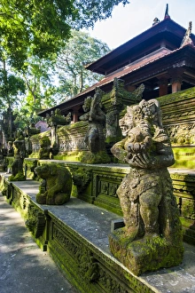 Ubud Prints: Overgrown statues in a temple in the Monkey Forest