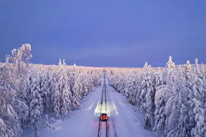 Akaslompolo Prints: Overhead view of a car driving on empty