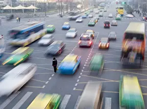 Rush Hour Prints: Overhead view of morning commute traffic on a busy Chinese city street with pedestrians