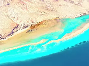 Canary Prints: Overhead view of volcanic cliffs overlooking the crystal sea