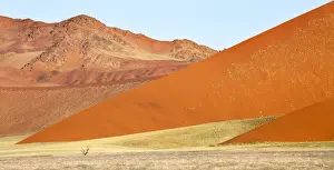 Sesriem Prints: Overlapping orange sand dunes of the ancient Namib Desert near Sesriem