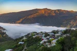 Overlook Prints: Overlooking the Silver town of Kubachi in Dagestan during sunrise with mist over the valley