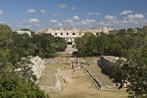 Foreground Prints: Overview of ball court in foreground and Cuadrangulo de las Monjas (Nuns Quadrangle) in background
