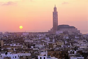 Captivating Prints: Overview with the Hassan II Mosque in the background at dusk, Casablanca, Morocco